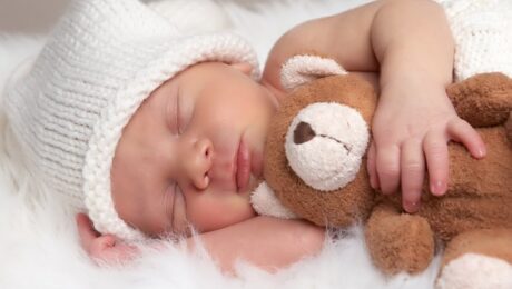 new born baby with teddy